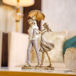 Figura Decorativa Familia con Paraguas 27 Cm