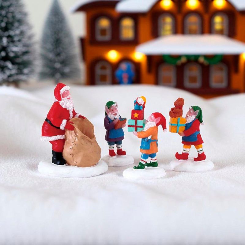 Set de 4 Figuras Santa y sus Elfos con Regalos para Villa Navideña