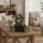 Fuente Decorativa con Luz y Ave Azul sobre Tronco