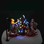 Figura Girando Alrededor del Árbol de Navidad con Luz y Movimiento