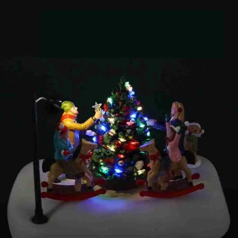 Figura Girando Alrededor del Árbol de Navidad con Luz y Movimiento