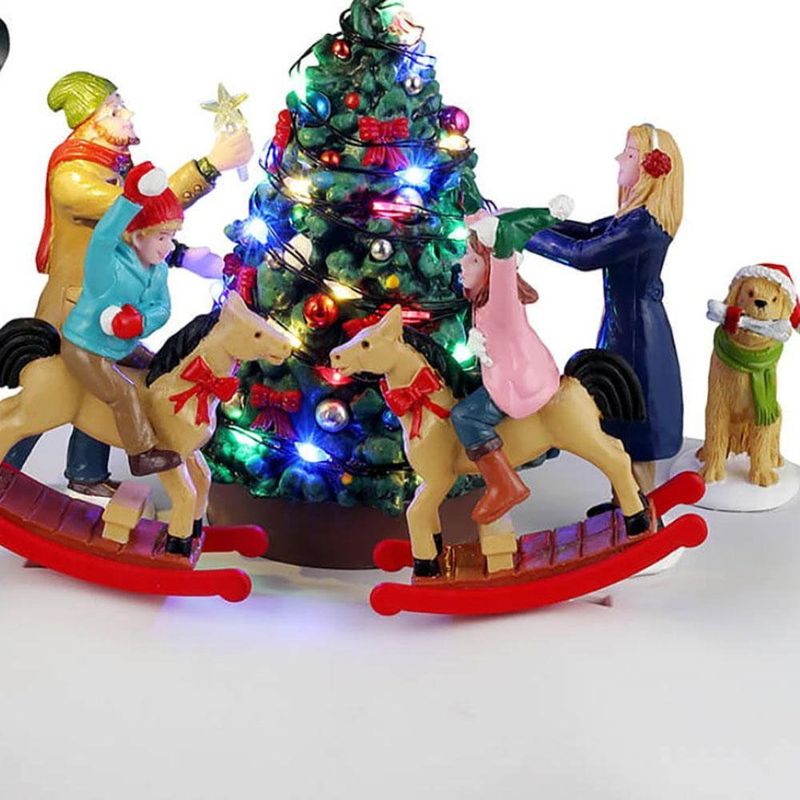 Figura Girando Alrededor del Árbol de Navidad con Luz y Movimiento