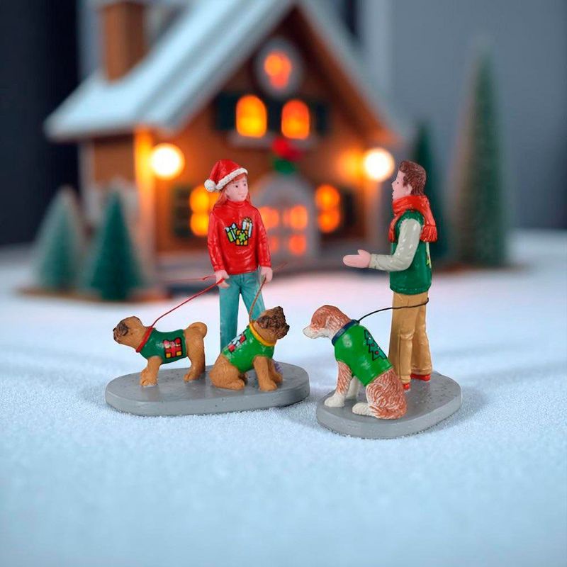 Set de 2 Figuras de Amigos Festivos con Perros para Villa Navideña