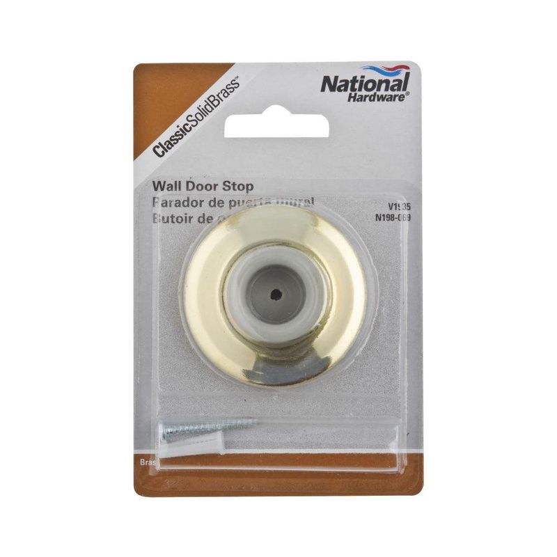 Tope de Pared Chapa Dorado