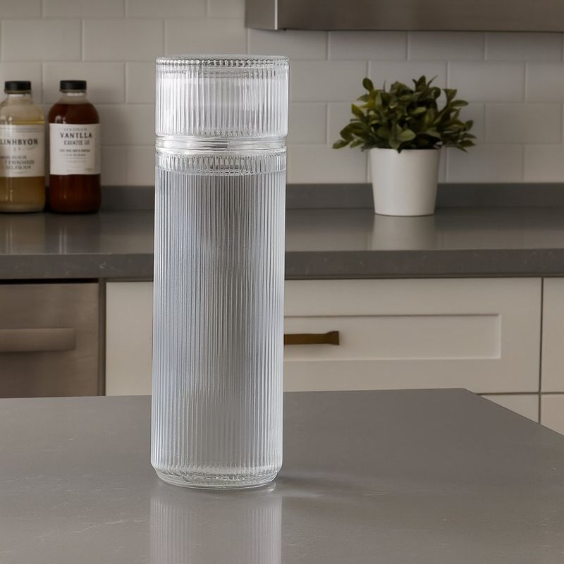 Botella con Vaso de Vidrio