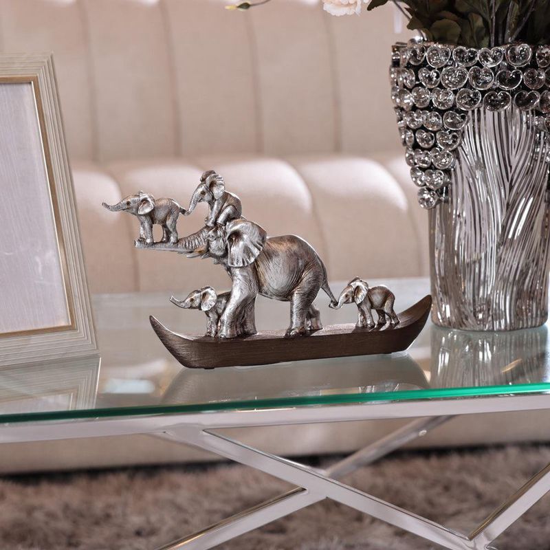Figura Decorativa de Elefantes en Bote