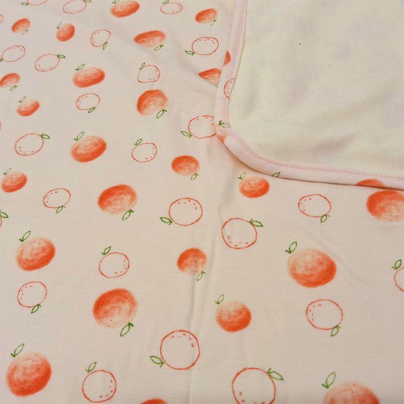 Set de Frazada y Cojín para Bebé con Estampado de Naranjas