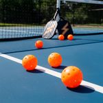 Set de 4 Pelotas para Pickleball Color Naranja