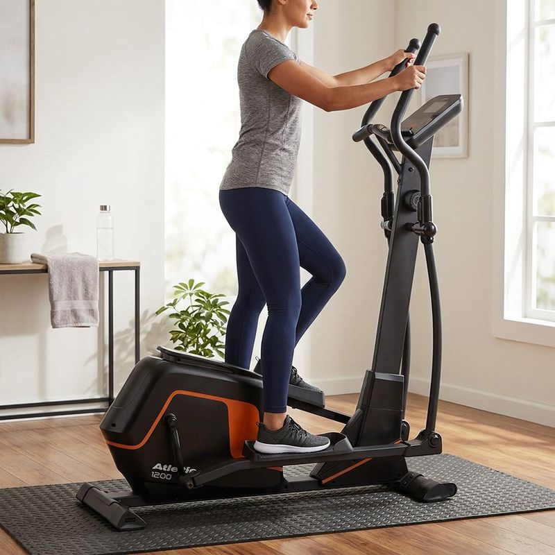 Elíptica 1200EP con Resistencia Magnética Color Negra con Detalles Naranja