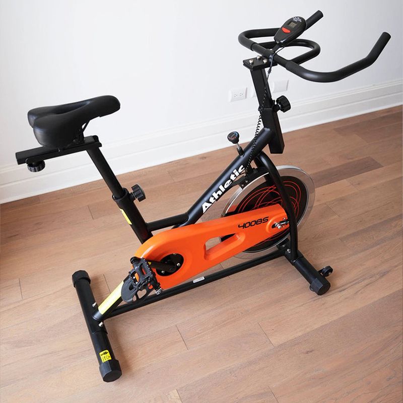 Bicicleta Spinning 400BS con Monitor Digital Color Negra con Detalles Naranja