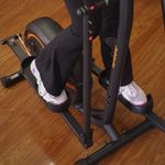 Elíptica 350E con Monitor Digital Color Negra con Detalles Naranja