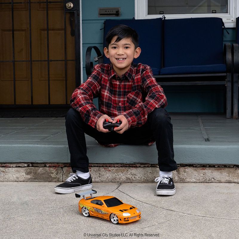 Carro Fast & Furious Toyota Supra R/C de Brian Escala 1:16 Color Naranja