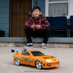 Carro Fast & Furious Toyota Supra R/C de Brian Escala 1:16 Color Naranja