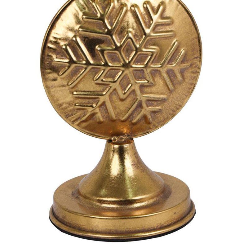 Portavelas Decorativo de Metal Dorado con Diseño de Copos de Nieve