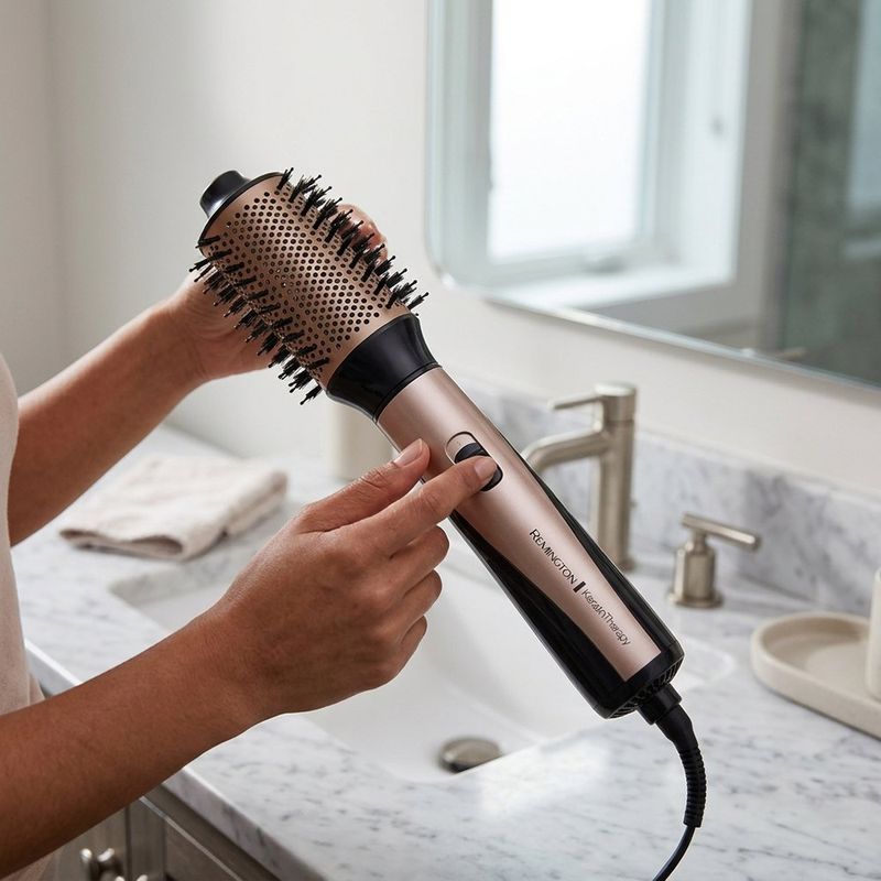 Cepillo Eléctrico Estilizador para Cabello Color Dorado y Negro