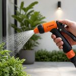 Pistola para Manguera Plástica de 2 Riegos con Clip de Flujo Color Negro y Naranja