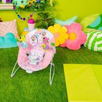 Silla Vibradora con Juguetes Paraíso Color Rosado