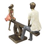 Figura Decorativa de Pareja en Sube y Baja Poliresina y Piedra 30.5 Cm Tono Bronce y Durazno