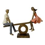 Figura Decorativa de Pareja en Sube y Baja Poliresina y Piedra 30.5 Cm Tono Bronce y Durazno