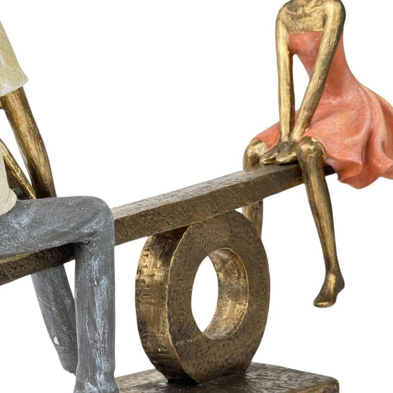 Figura Decorativa de Pareja en Sube y Baja Poliresina y Piedra 30.5 Cm Tono Bronce y Durazno