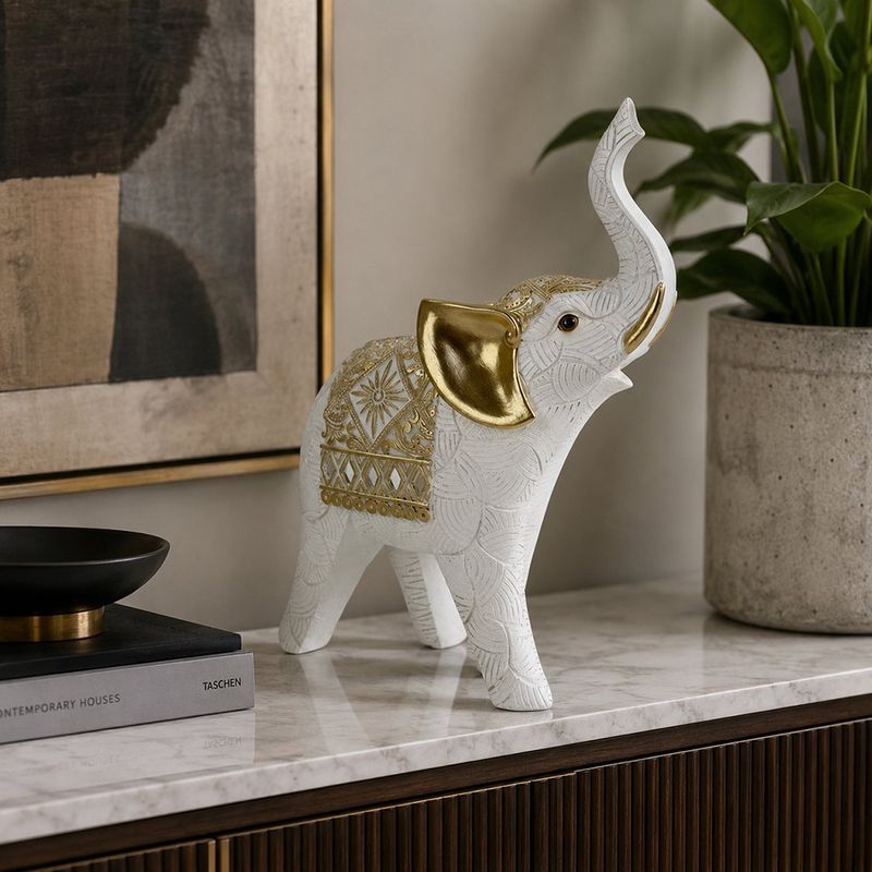 Figura Decorativa Elefante Derecho con Trompa Elevada 20.5 x 8.5 x 28.5 Cm Color Blanco y Dorado