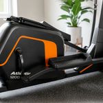 Elíptica de Diseño Ergonómico 1200EP con Resistencia Magnética de 8 Niveles, Monitor Digital y Sensores Negro y Naranja